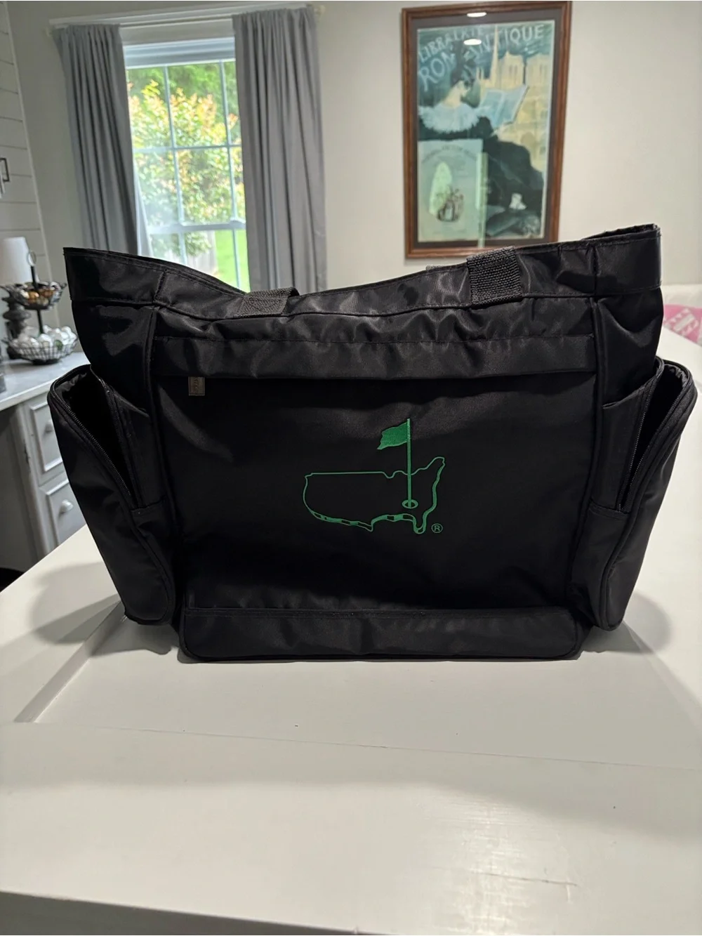 The Master’s officially licensed Black Tote Bag with Green Golf Flag Logo